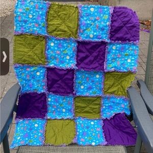 Handmade bright colorful rag quilt